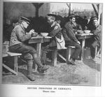 British POWs Eat Dinner in a German Prison Camp