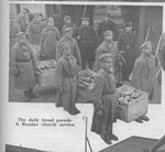 Russian POWs Deliver Bread Rations in a German Prison Camp