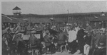 Russian YMCA Orchestra Performs in a Prison Camp Compound