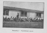 Polish POWs Repairing Their Uniforms at Bustyahaza