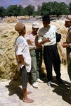 Community leader speaking with farmer in a village in Boir Ahmad