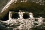 Sassanian (224-651 AD) open-air burial niches in the cliffsides by Reinhold Loeffler