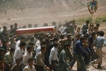 Funeral of a village's first martyr to the Islamic regime by Reinhold Loeffler