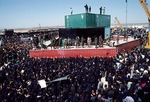 Mourners at funeral of Ayatollah Khomeni by Reinhold Loeffler