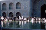 Men at ablutions before Friday prayer at Imam Mosque in Isfahan by Reinhold Loeffler