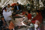 Family at afternoon rest at village outpost in Boir Ahmad by Reinhold Loeffler