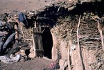 Door of home at a village outpost in Boir Ahmad by Reinhold Loeffler