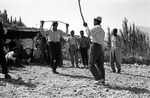Men's stick dance at wedding, rural Boir Ahmad by Reinhold Loeffler