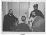 YMCA Secretary J.J. Hertig and Wounded Russian POWs by Anonymous